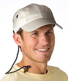 man wearing a beige shirt and cap