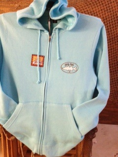 blue sweater with embroidered logos